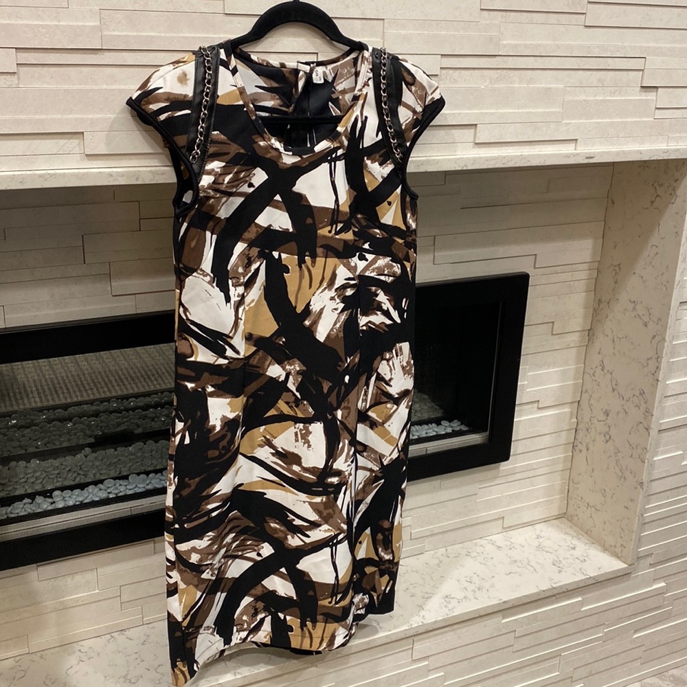 Black/brown patterned cap with sleeve shoulder pads faux leather trim chain